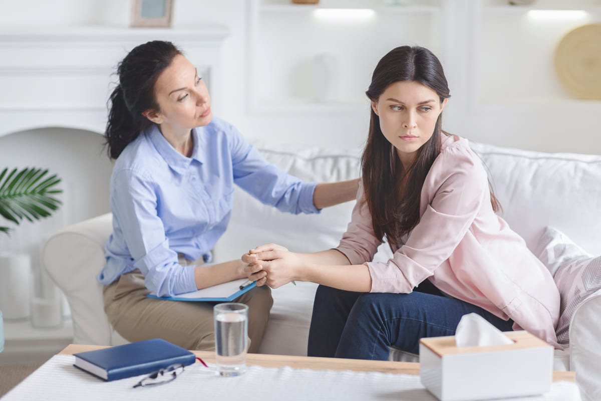 psychologist-comforting-sad-female-patient-in-offi-2025-03-18-17-31-12-utc(1)(1)